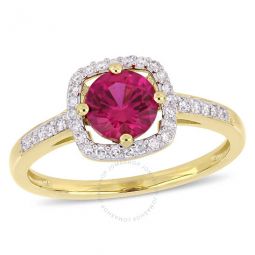 1 CT TGW Created Ruby and 1/7 CT TW Diamond Halo Ring In 10K Yellow Gold