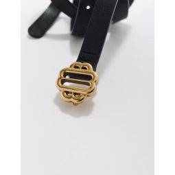Narrow black leather belt gold buckle