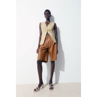 THE EMBOSSED-LEATHER BERMUDA SHORTS