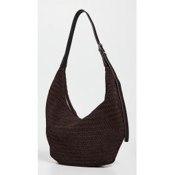 The Essential Curve Shoulder Bag in Handwoven Suede