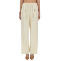 pleated high-waisted pants with relaxed fit