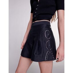 Openwork linen shorts with rivets
