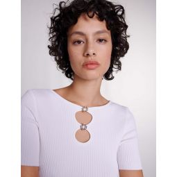 Cutaway knit top with jewellery