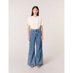 Flared jeans with studded waistband