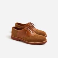 Saddle shoes in leather and English suede