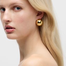 Oversized pearl stud earrings