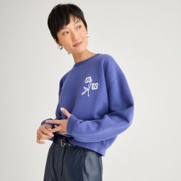 Cropped graphic sweatshirt with floral embroidery