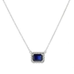 0.25ctw diamond and emerald cut sapphire pendant in 14k white gold