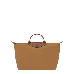 spacious travel bag with structured silhouette and leather accents